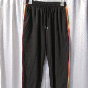 Black joggers with rainbow stripe on sides